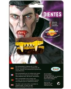 Dentier complètement dorée du vampire